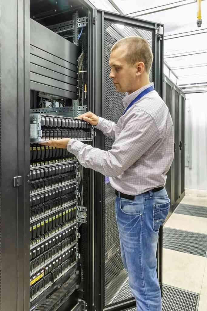 Man doing repair on cloud computer